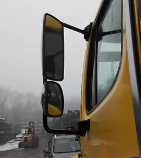 Freightliner M2 106 Left Side View Mirror for a 2011 Freightliner M2 106 Heavy Duty