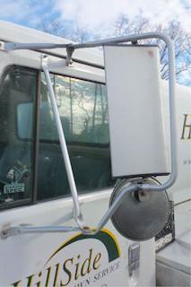 International 4700 LP Left Side View Mirror for a 2000 International 4700 LOW PROFILE