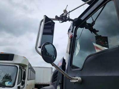 Mack Granite CV713 Left Side View Mirror for a 2006 Mack CV713 Granite