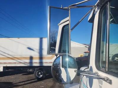 Volvo / WhiteGMC WG64T Left Side View Mirror for a 1995 Volvowhitegmc WG64T