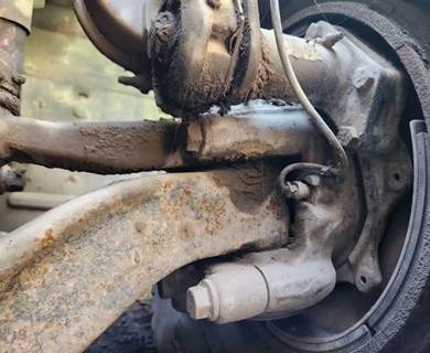 Mack Granite CV713 Left Spindle for a 2006 Mack CV713 Granite