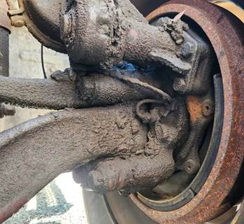 Mack Granite CV713 Left Spindle for a 2007 Mack CV713 Granite