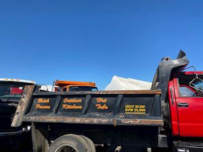 (Used) 2002 GMC C7500, Dump Body- Material: Steel, Length: Height:  Type: Pto