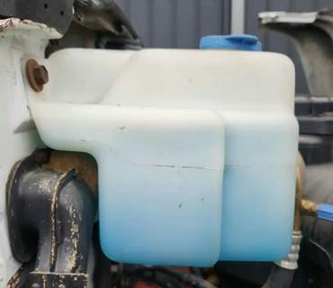 GMC TopKick C7000 Windshield Washer Reservoir for a 1991 GMC C7000 Topkick