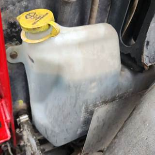 Mack Titan TD713 Windshield Washer Reservoir for a 2010 Mack TD713