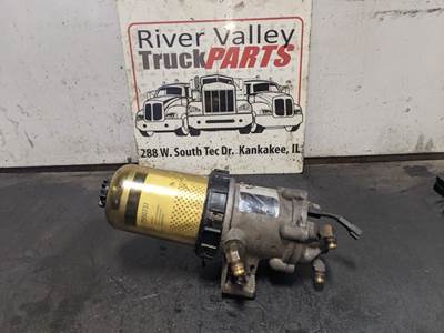 Good Used After Market Engine Fuel Filter Housing. The Fuel Filter Housing Has