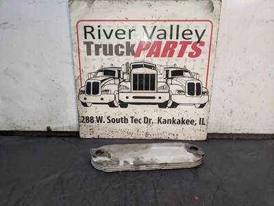 Isuzu 4HE1XS Engine Oil Cooler for a 1999 Isuzu NPR-HD