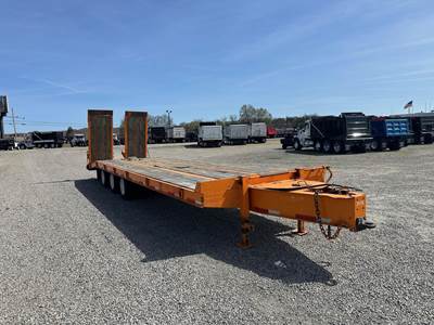 Kaufman 32x100 Tri Axle Steel Tag Trailer