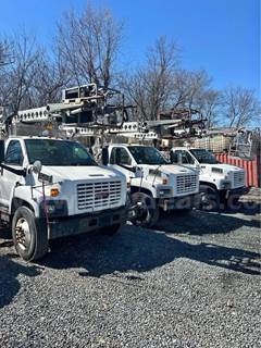 Three 2005 GMC 8500 Cable Placing Bucket Trucks
