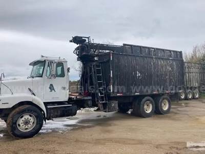 Knuckle Boom Mtd on 2000 Volvo WG T/A Refuse Truck