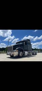 This black Peterbilt sleeper truck is set up as a full-size road tractor and is a solid candidate for an owner-operator,