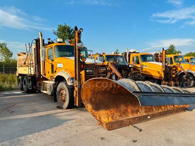 Various Makes and Models of Dump Trucks