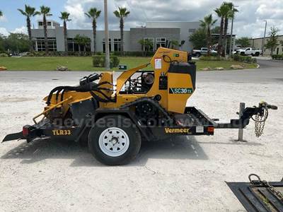 VERMEER COMPACT STUMP GRINDER MODEL SC30TX WITH VERMEER TRAILER MODEL TLR33