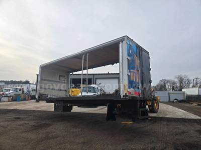 24 flatbed with Moffett forklift rack