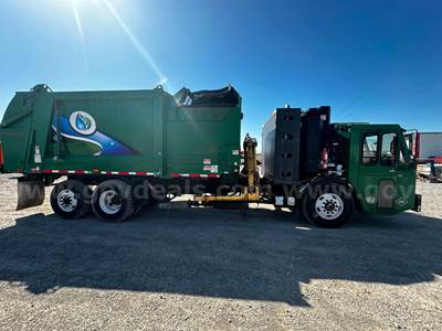 2014 Crane Carrier Co. Low Entry