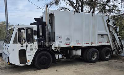 2010 Crane Carrier Co. Low Entry