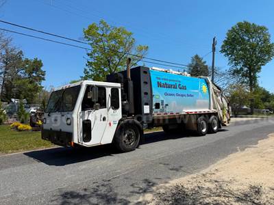 2010 Crane Carrier Rear load Trash Truck