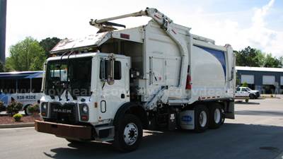 Mack TE64 with Heil Front Loading Refuse Body