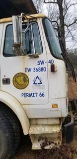 2000 VOLVO WX643 / CAVALEIR FRONT LOADER GARBAGE TRUCK