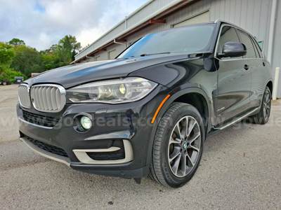 2014 BMW X5.  Can arrange shipping, just pay the driver at delivery.