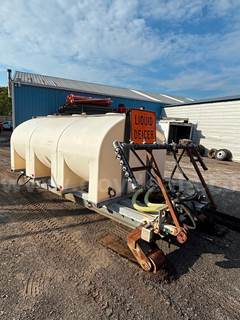 Brine sprayer on hook lift skid