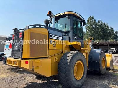 3 Lots: John Deere Loaders + CAT Roller