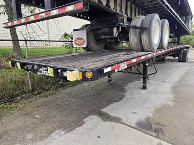 Fontaine 48x102 Steel Flatbed Trailer - Spring, Sliding Axle