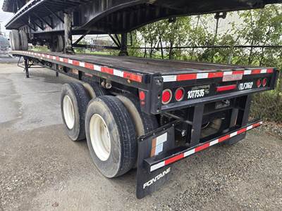 Fontaine 48x102 Steel Flatbed Trailer - Spring, Sliding Axle