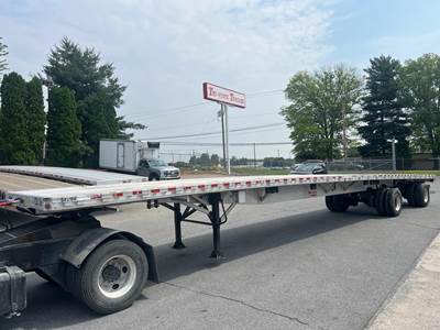 Reitnouer MAXMISER REAR AXLE SLIDE AND FRONT LIFT Flatbed Trailer