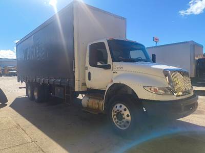 International MV607 Tandem Axle Curtain Side Truck - Cummins, 300HP, 10 Speed Manual