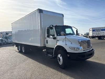 International MV607 Box Truck - 300HP, 10 Speed Manual, Roll up Door