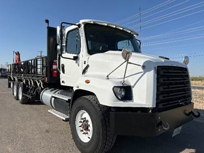 Freightliner 114SD Tandem Axle Flatbed Truck - 450HP, 10 Speed Manual