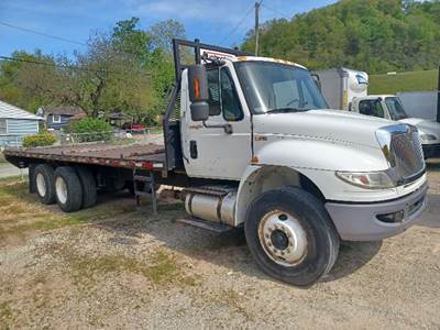 International 4400 Tandem Axle Flatbed Truck - 285HP, 6 Speed Manual