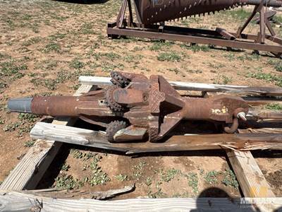 Heavy-Duty Tricone-Style Rock Drilling Bit Assembly With Multiple Roller Cones.
