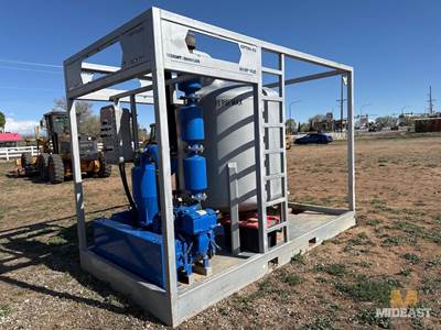 50 HP Skid-Mounted Vacuum Unit Enclosed In Steel Frame. Features Vertical