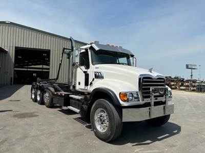 2004 Mack Granite CV713 Roll Off Truck with Automatic Tarp and Lift Axle -- Manual Transmission -- Location: Houston, TX