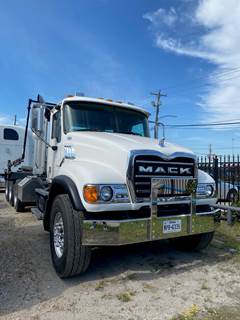 2004 Mack Granite CV713 Roll Off Truck with Automatic Transmission, Automatic Tarp, and Lift Axle -- Location: Houston, TX