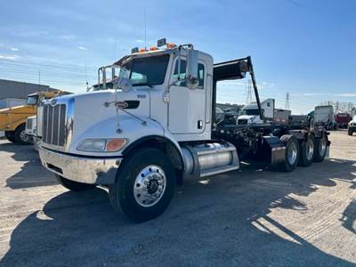 **REDUCED PRICE** 2008 Peterbilt 340 Roll Off Truck with Automatic Tarp and Lift Axle -- Automatic Transmission -- Location: Houston, TX