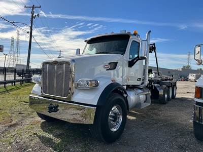 2018 Peterbilt Roll Off Truck with Manual Transmission, Automatic Tarp and Lift Axle -- Location: Houston, TX
