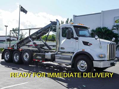 Peterbilt 548 Roll Off Truck