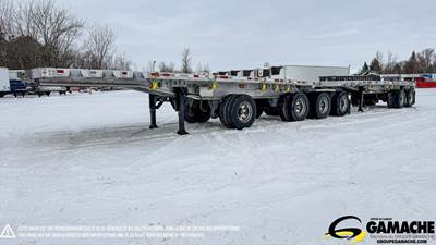 Manac 28x102 Six Axle Aluminum Flatbed Trailer - Hendrickson, Sliding Spread Axle