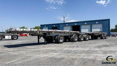 Manac 28x102 Six Axle Aluminum Flatbed Trailer - Hendrickson, Sliding Spread Axle