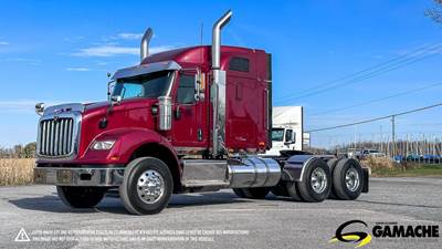International HX Sleeper Semi Truck - 42" Mid Roof Sleeper, Cummins 565HP, 18 Speed Manual