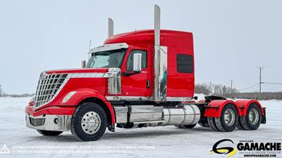 International LoneStar Sleeper Semi Truck - 64" Raised Roof Sleeper, Cummins 565HP, 18 Speed Ultrashift Plus Amt