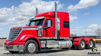 International LoneStar Sleeper Semi Truck - 64" Raised Roof Sleeper, Cummins 565HP, 18 Speed Ultrashift Plus Amt