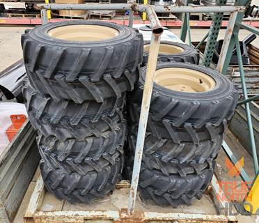 TRACTION MASTER 29X12.5-15 NHS Tires poly filled Tire & Rim