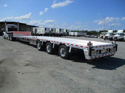 Reitnouer BIG BUBBA DROP TRI AXLE W/ CONTAINER LOCKS Drop Deck Trailer