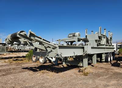 TRI-AXLE CRUSHER TRAILER, (no crusher) includes 150 h.p. crusher motor, Deister 44” wide x 20’ long vibrating grizzly feeder, 8' x 22' Hopper