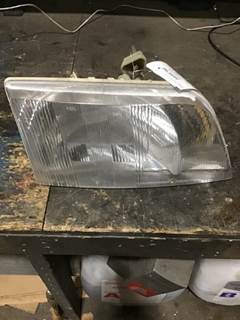 Volvo VNL Left Headlight Assembly
