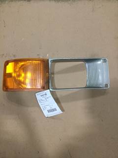 International 4700 Left Headlight Bezel